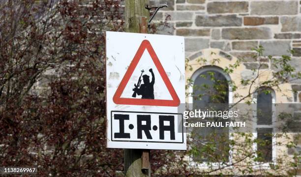 Picture shows an Irish Republican Army sniper warning sign over-looking the Bogside area of Derry in Northern Ireland on April 20, 2019. Two...