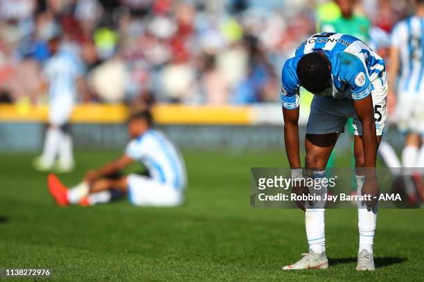 Dejected Terence Kongolo of Huddersfield Town reacts at full time during the Premier League match between Huddersfield Town and Watford FC at John...