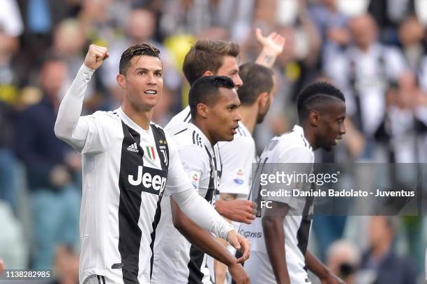 Cristiano Ronaldo, Alex Sandro, Daniele Rugani and Blaise Matuidi of Juventus celebrate after 2-1 scored by an own goal of Germán Pezzella of AFC...