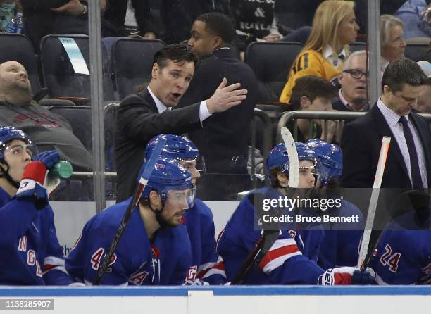 Head coach David Quinn of the New York Rangers speaks to his players during the second period against the Pittsburgh Penguins at Madison Square...