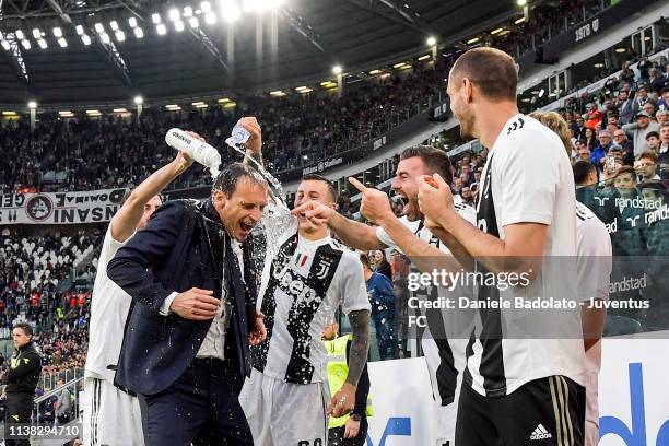 Head coach of Juventus Massimiliano Allegri celebrates with his players the winning of the Italian championship 2018-2019 after the Serie A match...