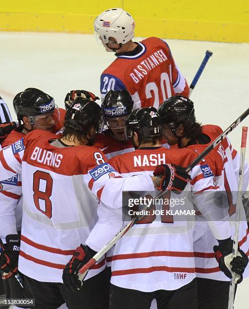 Canadian players celebrate their goal during their IIHF Ice Hockey World Championship group F qualification match between Canada and Norway in Kosice...