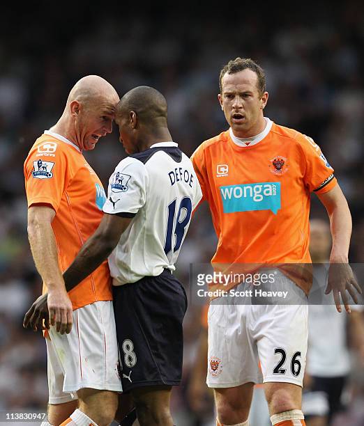 Stephen Crainey of Blackpool clashes with Jermain Defoe of Spurs during the Barclays Premier League match between Tottenham Hotspur and Blackpool at...