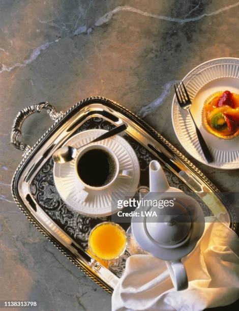 silver tray with coffee, juice and fruit tart - silver platter stock pictures, royalty-free photos & images