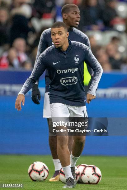 March 25: Kylian Mbappé of France and Paul Pogba of France warming up with team-mates before the France V Iceland, 2020 European Championship...