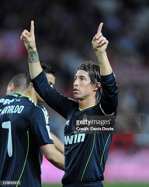 Sergio Ramos of Real Madrid celebrates after scoring his team's opening goal during the La Liga match between Sevilla and Real Madrid at Estadio...