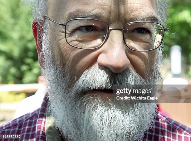 Assistant Sedgwick County Zoo Director Jim Marlett gives a statement following the mauling of an elementary school student by an amur leopard,...