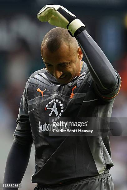 Heurelho Gomes of Spurs reacts during the Barclays Premier League match between Tottenham Hotspur and Blackpool at White Hart Lane on May 7, 2011 in...