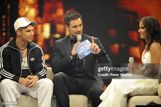 Pietro Lombardi, presenter Marco Schreyl and Sarah Engels during the 'Deutschland Sucht Den Superstar' Finale on May 07, 2011 in Cologne, Germany.