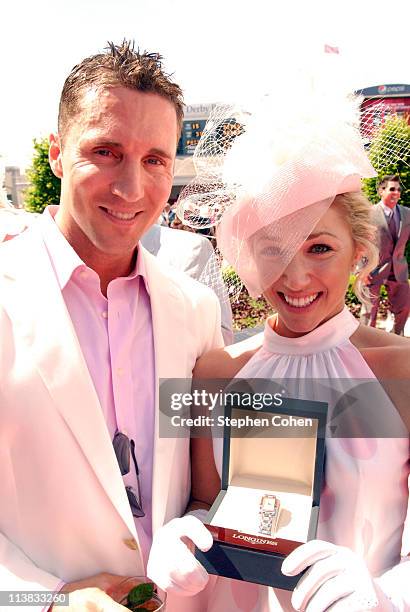 Jason Costelle and Melissa Jones attends the Kentucky Oaks at Churchill Downs on May 6, 2011 in Louisville, Kentucky.