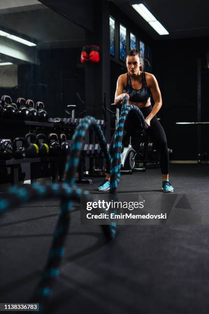 battle ropes session at the gym - battle rope stock pictures, royalty-free photos & images