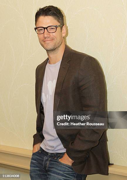 Actor James Scott with "Days Of Our Lives" poses for a photo before a book signing event at Denver Mariott South on May 7, 2011 in Littleton,...