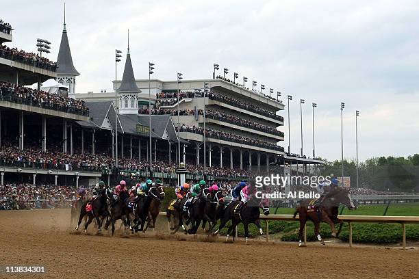 Jockey Jesus L. Castanon , riding Shackleford, leads the field through turn one during the 137th Kentucky Derby at Churchill Downs on May 7, 2011 in...