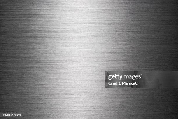 brushed metallic surface texture - stainless steel 個照片及圖片檔