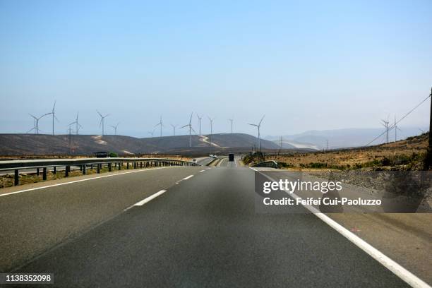 group of wind turbines on the highway near la serena, coquimbo region, chile - la serena bildbanksfoton och bilder