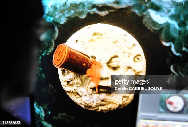 Technician from Technicolor works on April 21, 2011 on the restoration of the 1902 movie "Le voyage dans la lune" by French director Georges Melies....