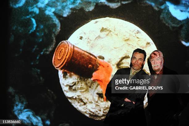 RAYNALDYSerge Bromberg , CEO of Lobster Films and Tom Burton, Technicolor's Executive Director of Restoration Services, pose on April 21, 2011...