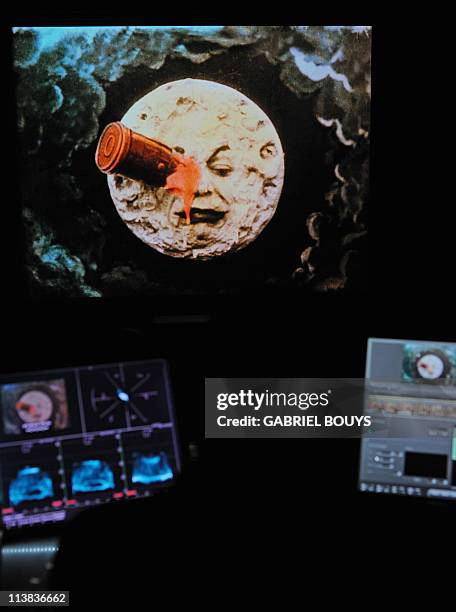 Technician from Technicolor works on April 21, 2011 on the restoration of the 1902 movie "Le voyage dans la lune" by French director Georges Melies....