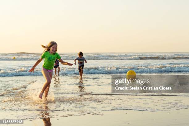 children playing on beach bredene aan zee belgium - prince alexander of belgium stockfoto's en -beelden