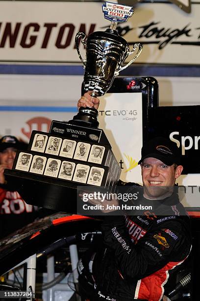 Regan Smith, driver of the Furniture Row Companies Chevrolet, celebrates with in Victory Lane after winning the NASCAR Sprint Cup Series SHOWTIME...