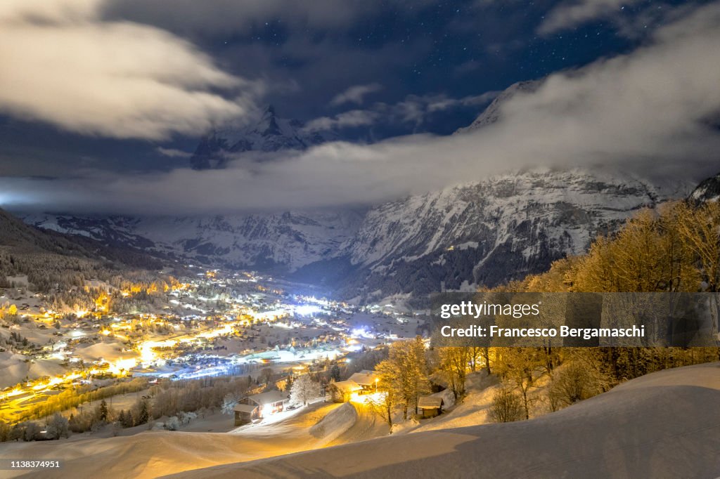 Light of the village at night. Grindelwald, Canton of Bern, Switzerland, Europe.