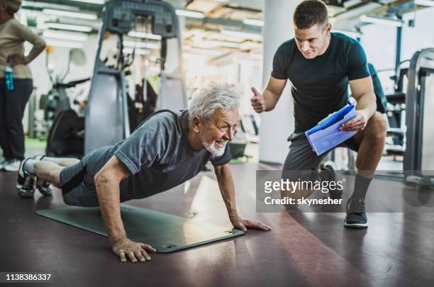 come on, one more push-up! - coach stock pictures, royalty-free photos & images