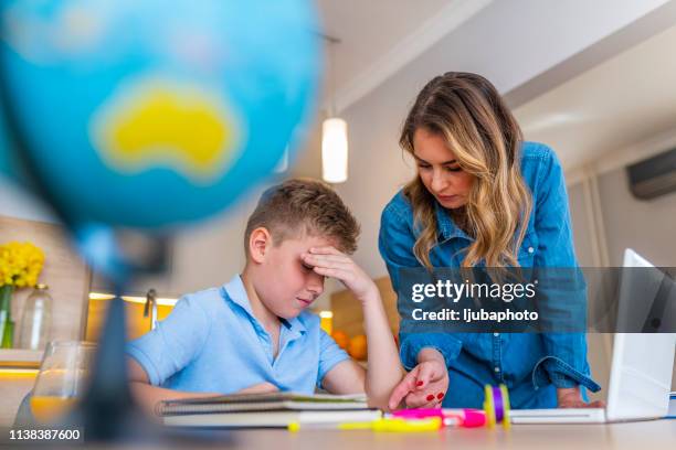 teenage boy having problems in finishing homework - homework frustration stock pictures, royalty-free photos & images