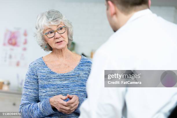 talking with a patient - diabetes and heart disease stock pictures, royalty-free photos & images