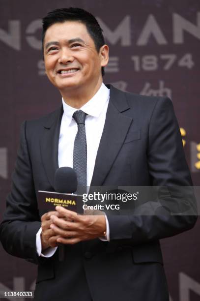 Hong Kong actor Chow Yun-fat attends Normana flagship store opening ceremony at Palace 66 on May 7, 2011 in Shenyang, Liaoning Province of China.