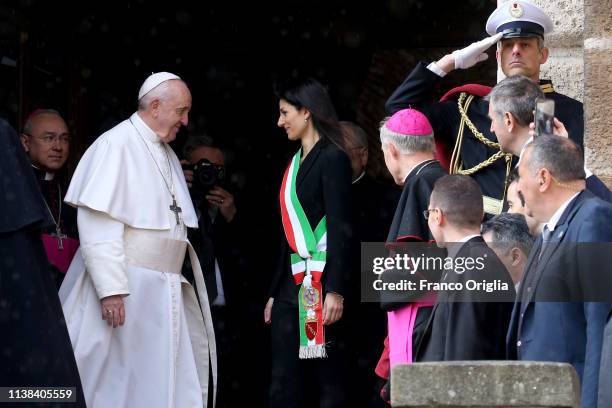 Pope Francis is received by the Rome's mayor Virginia Raggi as he arrives at the Campidoglio Hill for a visit on March 26, 2019 in Rome, Italy.