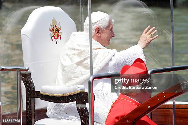 Pope Benedict XVI acknowledges well-wishers around the Gran Canal on May 8, 2011 in Venice, Italy. Pope Benedict XVI is visiting Venice, some 26...