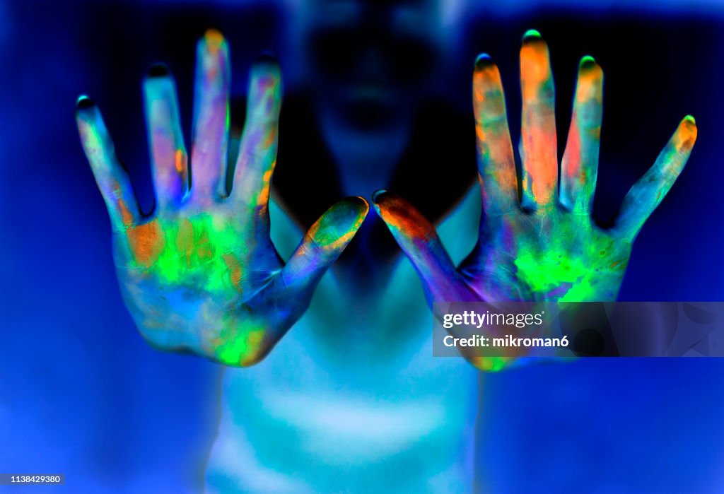 Hands Showing Powder Paint During Party