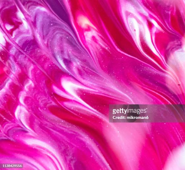 abstract liquid multicolor background - metallic pink stock pictures, royalty-free photos & images