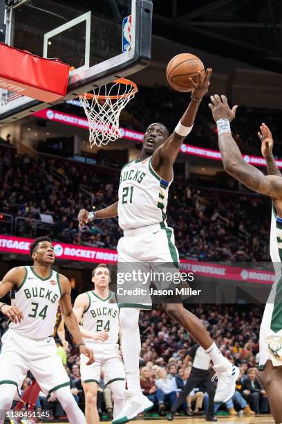 Tony Snell of the Milwaukee Bucks shoots during the first half against the Cleveland Cavaliers at Quicken Loans Arena on December 14, 2018 in...