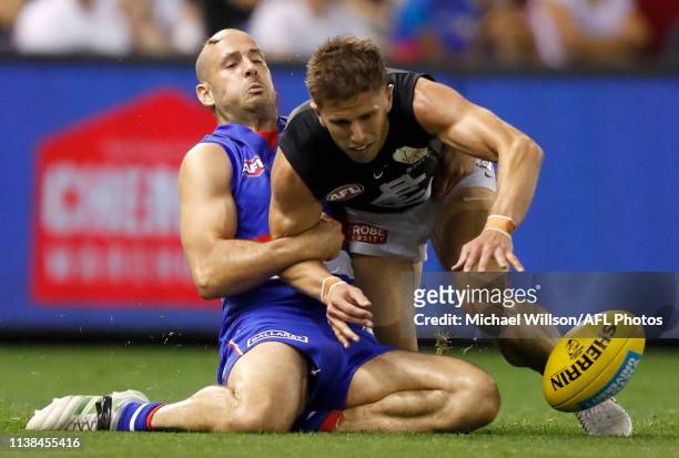Marc Murphy of the Blues and Tory Dickson of the Bulldogs compete for the ball during the 2019 AFL round 05 match between the Western Bulldogs and...
