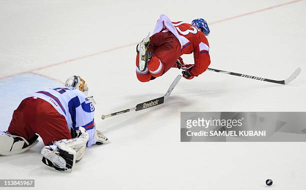 Czech Republic's Petr Prucha vies with Russia's Konstantin Barulin during their IIHF Ice Hockey World Championship Qualification Round match in...