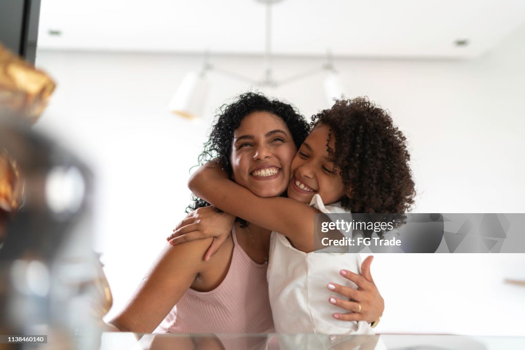 Mother and daughter celebrating easter at home