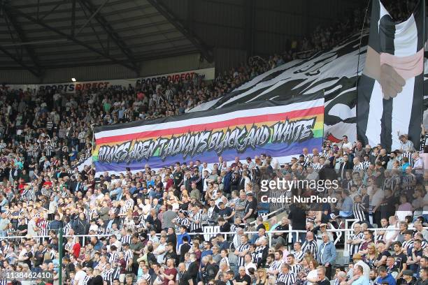 Newcastle United fans unveil a banner in support of LGBT and anti racism during the Premier League match between Newcastle United and Southampton at...
