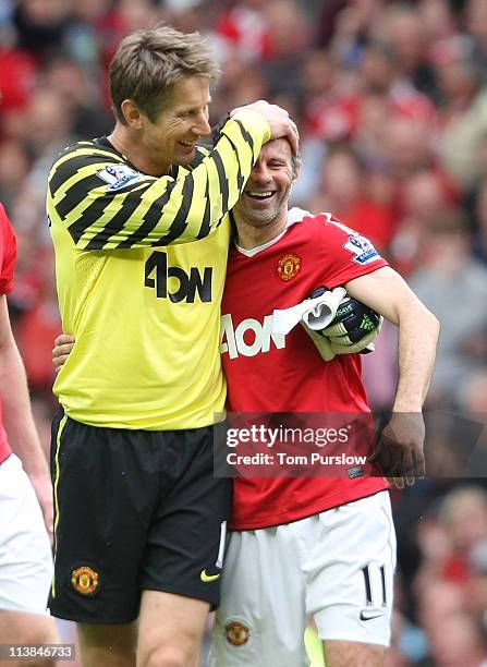 Edwin van der Sar and Ryan Giggs of Manchester United celebrate at final whistle of the Barclays Premier League match between Manchester United and...