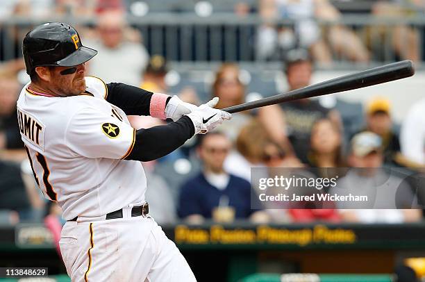 Ryan Doumit of the Pittsburgh Pirates hits a three run home run against the Houston Astros during the game on May 8, 2011 at PNC Park in Pittsburgh,...