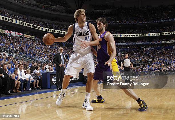 Dirk Nowitzki of the Dallas Mavericks looks to pass against Pau Gasol of the Los Angeles Lakers during Game Four of the Western Conference Semifinals...