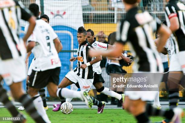 Neymar Santos in action during a match against Corinthians as part of Sao Paulo State Championship 2011 at Pacaembu stadium on May 8 in Sao Paulo,...