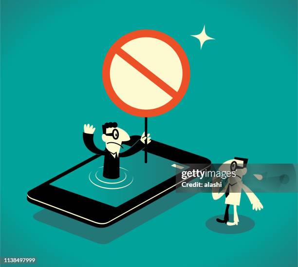 geschäftsmann vom smartphone zeigt ein leeres verbotsschild an einen anderen mann - social media abuse stock-grafiken, -clipart, -cartoons und -symbole