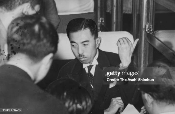 Prime Minister Fumimaro Konoe speaks to media reporters on his way back to Tokyo after reporting on Marco Polo Bridge Incident to Emperor Hirohito on...