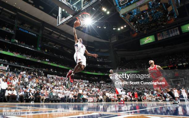 Joe Johnson of the Atlanta Hawks dunks against the Chicago Bulls in Game Four of the Eastern Conference Semifinals during the 2011 NBA Playoffs on...