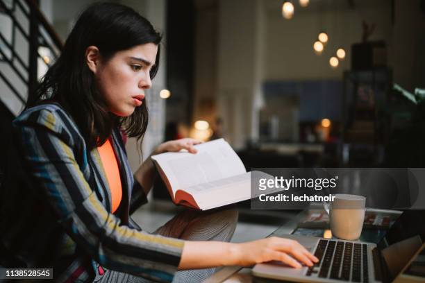 young woman doing her studies in Downtown Los Angeles apartment