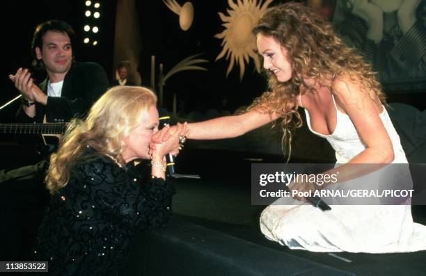 Singer Vanessa Paradis and actress Jeanne Moreau during Cannes Film Festival in Cannes, France in May 1995 - Vanessa Paradis sang "Le Tourbillon", a...