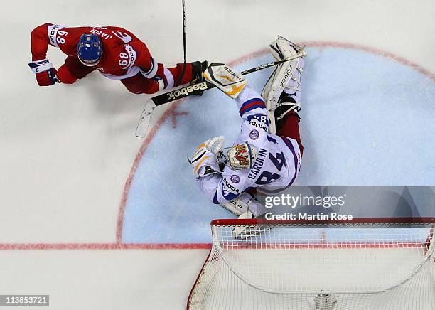 Jaromir Jagr of Czech Republic fails to score over Konstantin Barulin , oaltender of Russia during the IIHF World Championship qualification match...