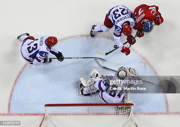 Konstantin Barulin , goaltender of Russia saves the shot of Petr Prucha of Czech Republic during the IIHF World Championship qualification match...