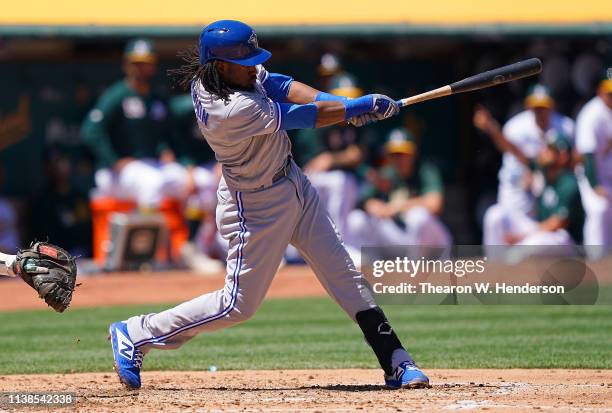 Alen Hanson of the Toronto Blue Jays hits an rbi single scoring Rowdy Tellez against the Oakland Athletics in the top of the third inning of a Major...